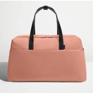 Away Coral Travel Duffel with Black Handles